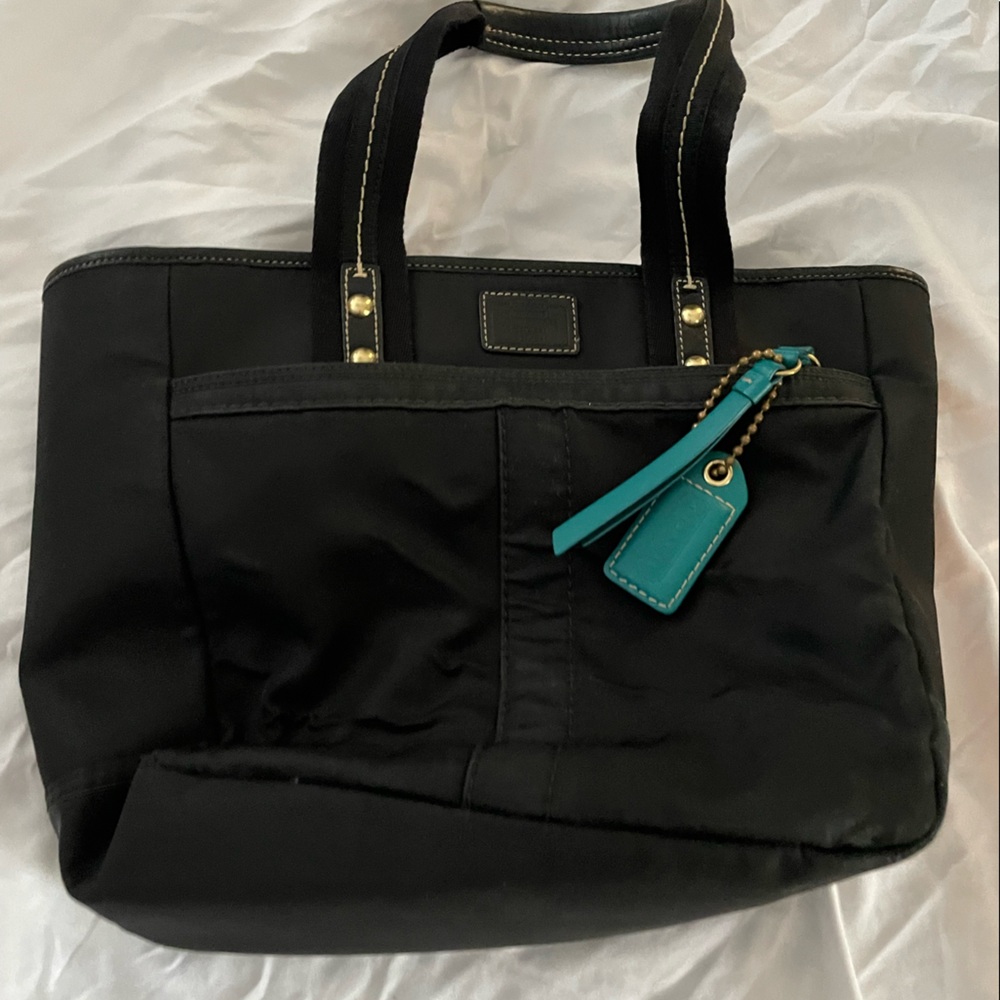 Black and teal Coach bag